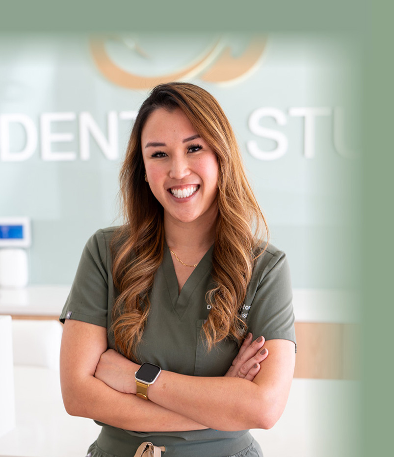 Orange dentist Doctor Janelle Comfort smiling