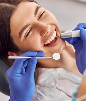 Woman smiling in the dental chair