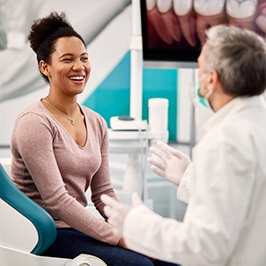 A woman talking to her dentist